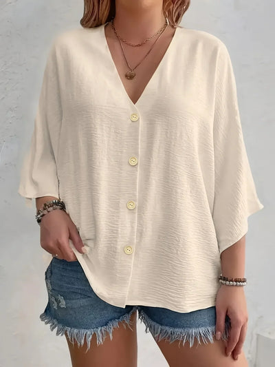 Signe – Blus med knäppning och ¾-ärm