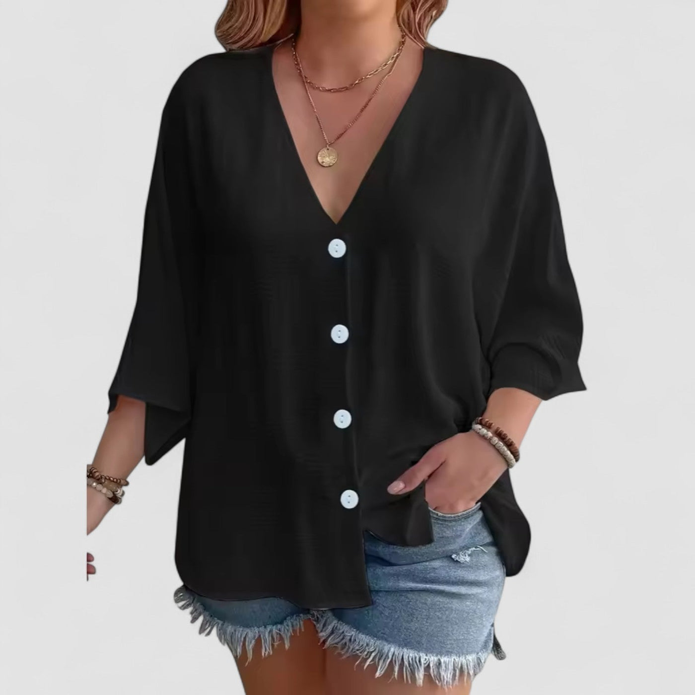 Signe – Blus med knäppning och ¾-ärm